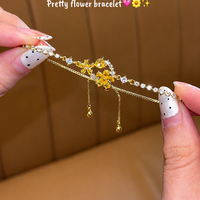 Adjustable Flower Charm Bracelet
